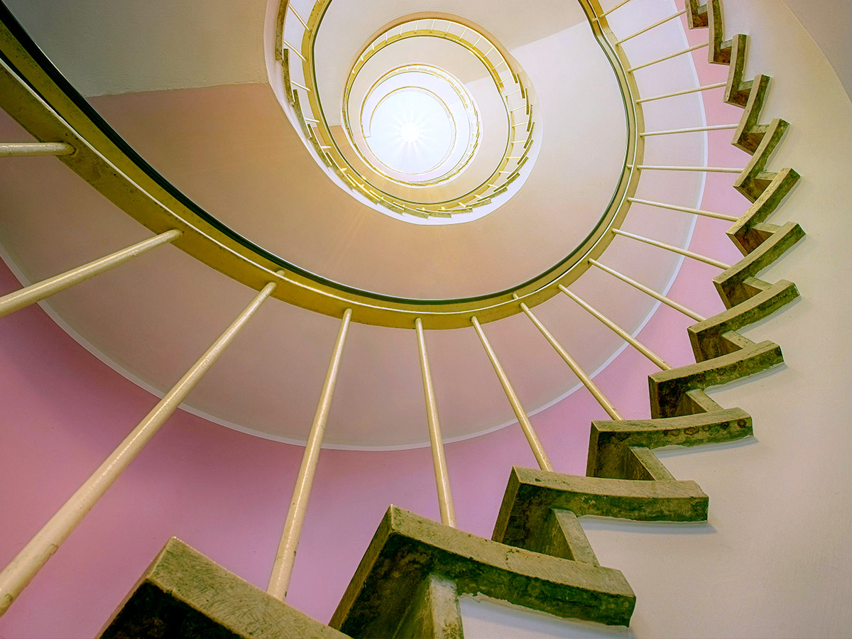 Spiral staircase viewed from below, symbolizing ways to grow your career on your own